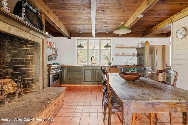 kitchen with wood ceiling, beam ceiling, stainless steel appliances, and a sink