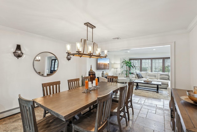 dining space with visible vents, stone tile floors, an inviting chandelier, crown molding, and a baseboard radiator