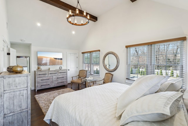 bedroom with dark wood finished floors, beam ceiling, high vaulted ceiling, and an inviting chandelier