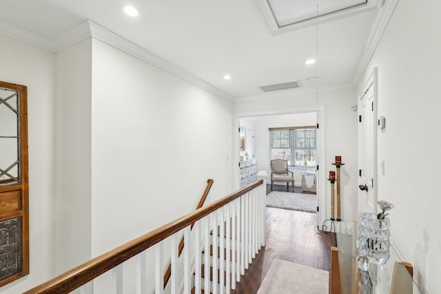 hall with visible vents, dark wood-type flooring, recessed lighting, crown molding, and attic access