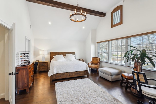 bedroom with beamed ceiling, high vaulted ceiling, an inviting chandelier, and dark wood finished floors