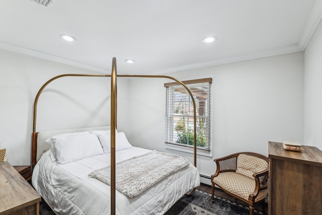 bedroom with a baseboard heating unit, crown molding, recessed lighting, and dark wood-style floors