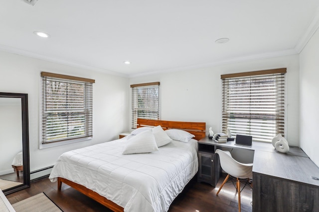 bedroom with a baseboard heating unit, crown molding, recessed lighting, and wood finished floors