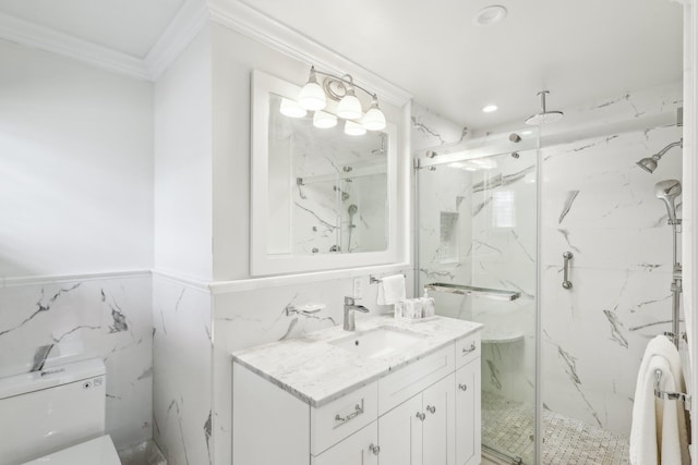 full bath with vanity, toilet, a marble finish shower, and ornamental molding