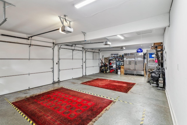 garage featuring a garage door opener