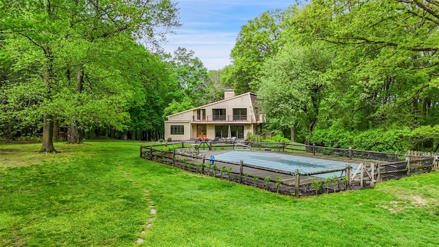 25 Moseman Ave, Katonah, NY 10536 - back of property with a chimney and a forest view