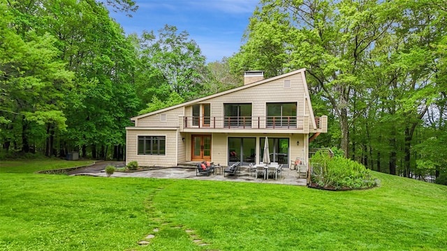 25 Moseman Ave, Katonah, NY 10536 - back of house with a lawn, a balcony, and a patio