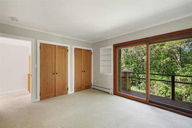 25 Moseman Ave, Katonah, NY 10536 - unfurnished bedroom featuring a baseboard radiator, multiple windows, light carpet, two closets, and crown molding
