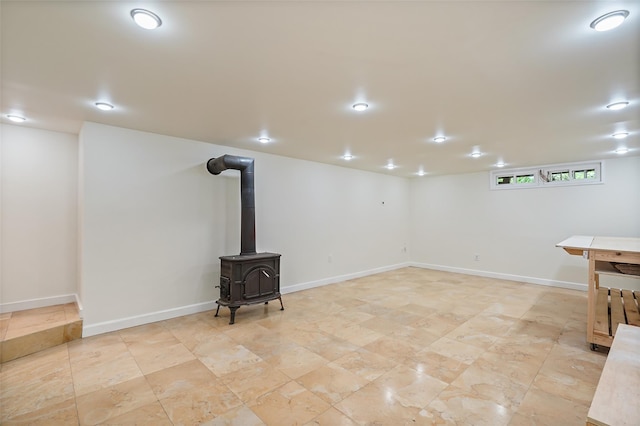 25 Moseman Ave, Katonah, NY 10536 - below grade area with a wood stove and baseboards