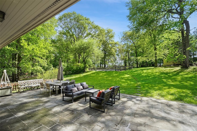 25 Moseman Ave, Katonah, NY 10536 - view of patio / terrace with outdoor dining space, view of scattered trees, and an outdoor living space
