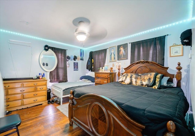 bedroom with wood finished floors