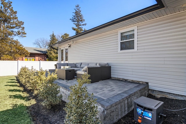 view of patio / terrace with french doors, an outdoor hangout area, and fence