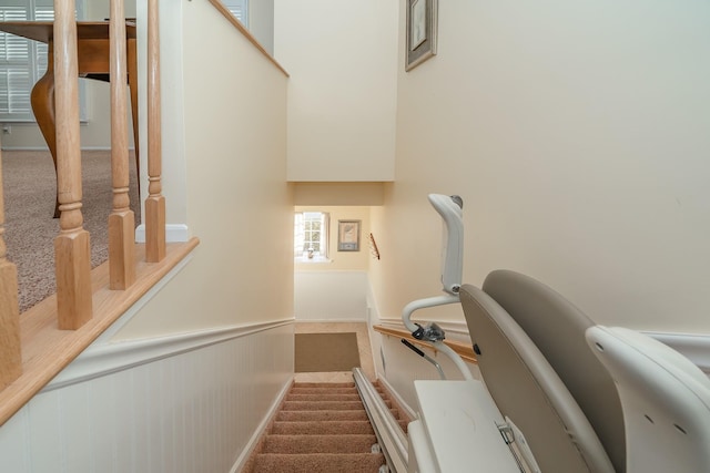 stairs with wainscoting