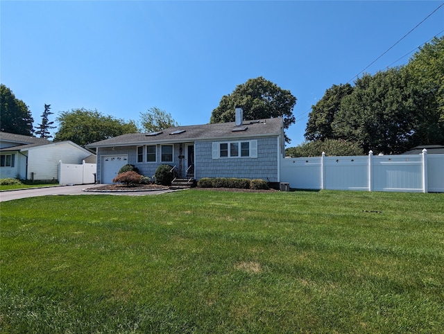 ranch-style home featuring a garage, concrete driveway, a front lawn, and fence