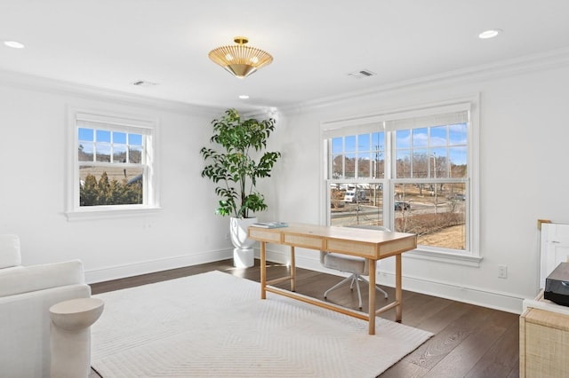 office featuring dark wood-style floors, visible vents, ornamental molding, and baseboards