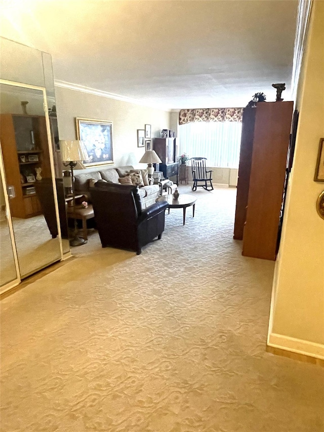 carpeted living area featuring ornamental molding