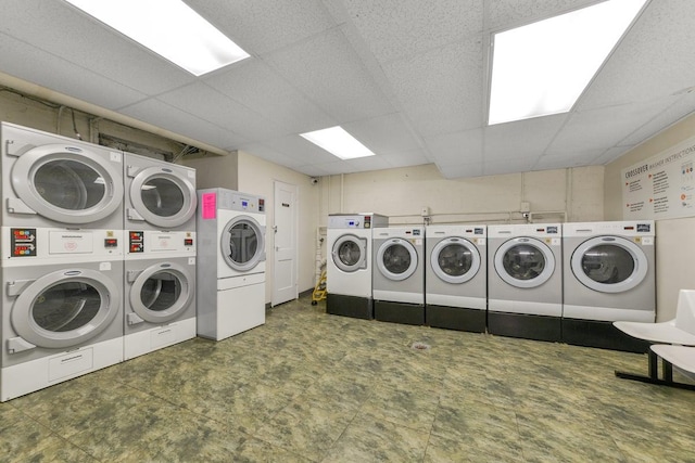 15 Canterbury Rd Unit C11, Great Neck, NY 11021 - shared laundry area featuring stacked washer and dryer, independent washer and dryer, and tile patterned floors