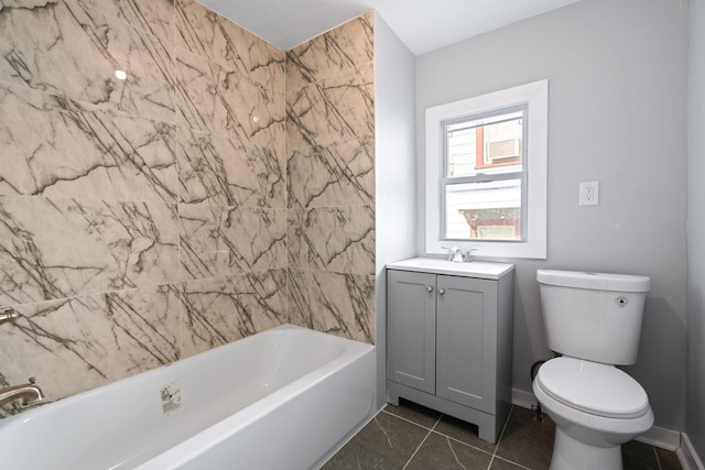 bathroom featuring a washtub, toilet, vanity, baseboards, and walk in shower
