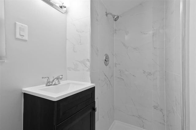 full bathroom featuring a stall shower and vanity