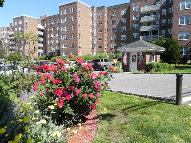 view of property featuring uncovered parking