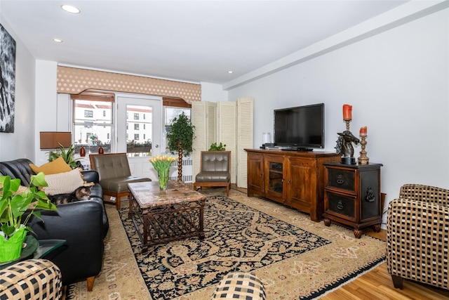 living area featuring recessed lighting and wood finished floors