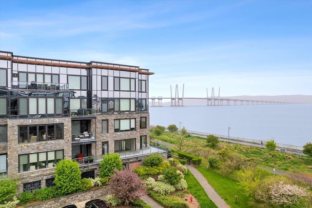 view of building exterior featuring a water view