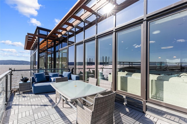 wooden terrace featuring an outdoor living space