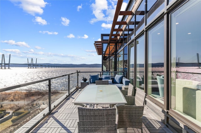 deck featuring outdoor dining area