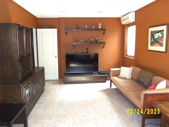 living area with light tile patterned floors and a wall mounted AC