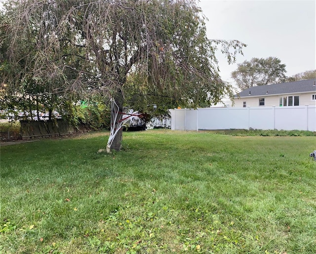 view of yard with fence