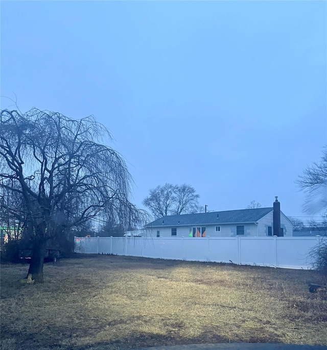 view of yard featuring fence