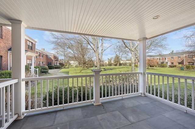 balcony with a residential view and a porch