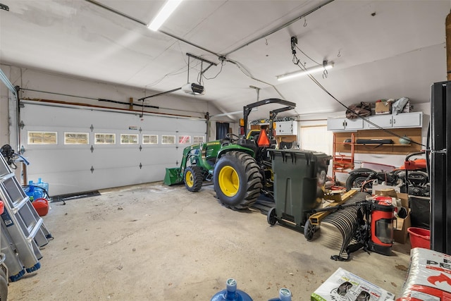 garage featuring a garage door opener