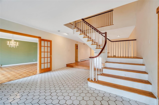 stairway with ornamental molding, baseboard heating, and an inviting chandelier