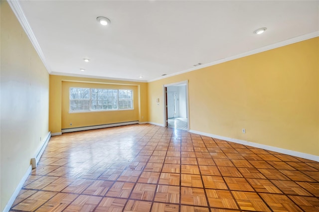 spare room featuring a baseboard heating unit, baseboards, crown molding, and baseboard heating