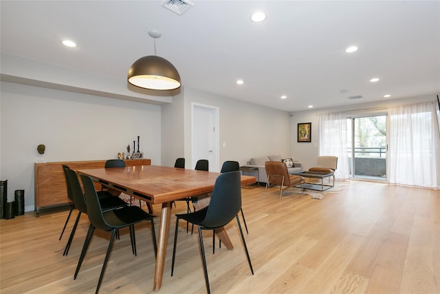 dining space featuring recessed lighting, visible vents, and light wood-style flooring