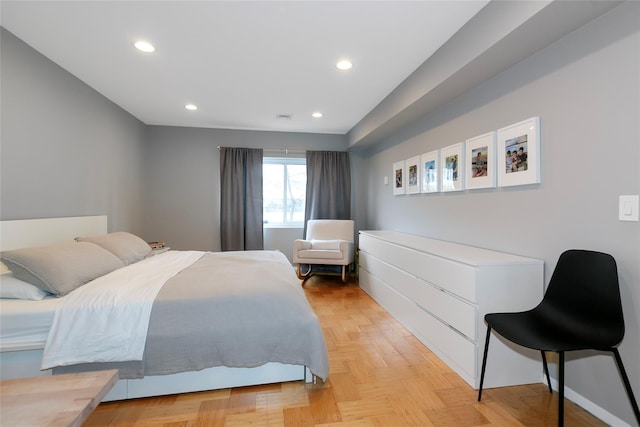 bedroom featuring visible vents and recessed lighting