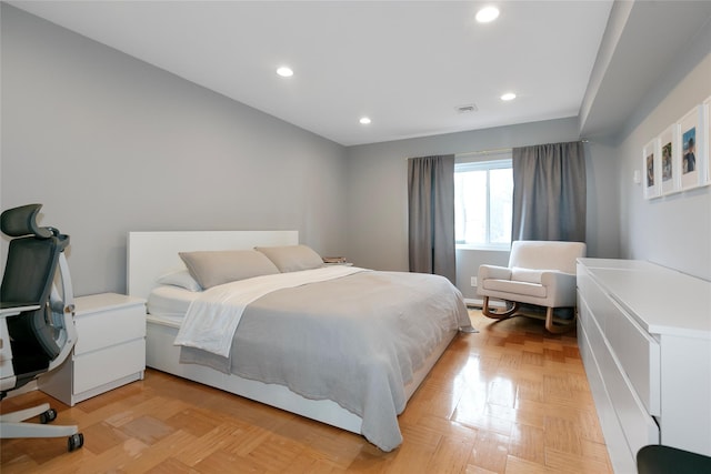 bedroom with visible vents and recessed lighting