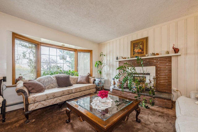 carpeted living area with a baseboard heating unit, a fireplace, and a textured ceiling