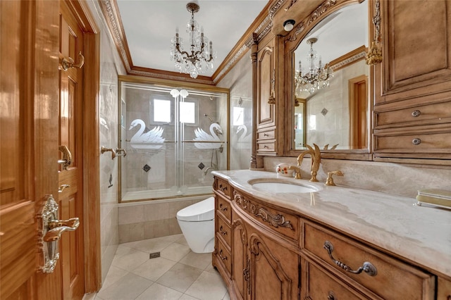 bathroom with crown molding, tiled shower / bath, toilet, a chandelier, and tile patterned flooring