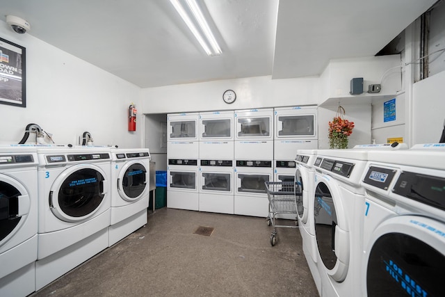 common laundry area with separate washer and dryer and stacked washer / dryer