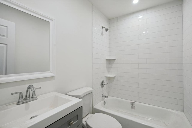 full bath with shower / bath combination, vanity, and toilet