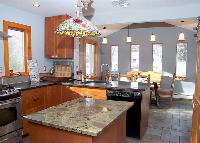 kitchen featuring brown cabinets, stone tile floors, visible vents, stainless steel gas stove, and dishwasher