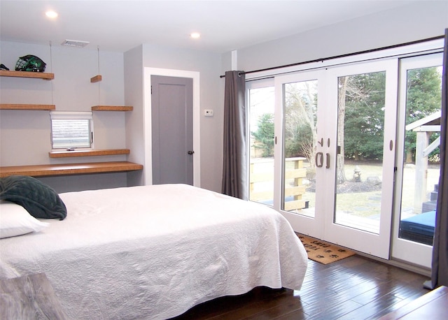 bedroom featuring dark wood-style floors, french doors, recessed lighting, visible vents, and access to outside