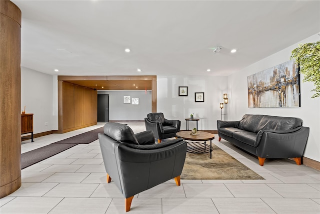 living room featuring recessed lighting and light tile patterned floors