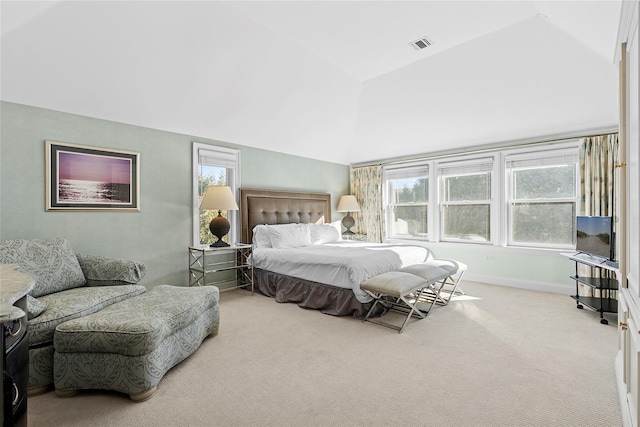 carpeted bedroom featuring visible vents, multiple windows, baseboards, and vaulted ceiling