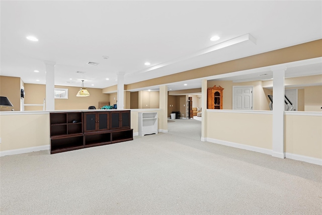 interior space with carpet, baseboards, and recessed lighting