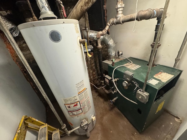 utility room featuring water heater