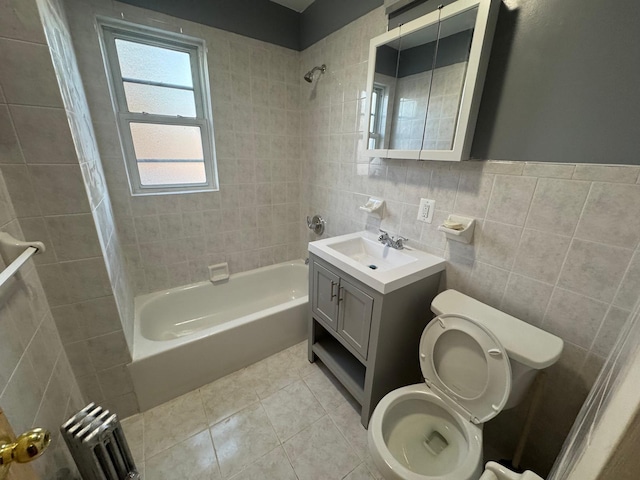 full bathroom with tile walls, radiator, bathtub / shower combination, toilet, and tile patterned flooring