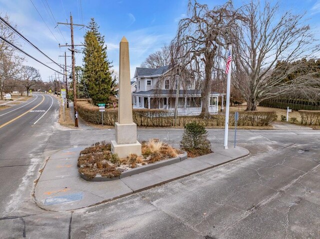 200 Village Ln, Orient, NY 11957 - view of asphalt street with sidewalks and curbs